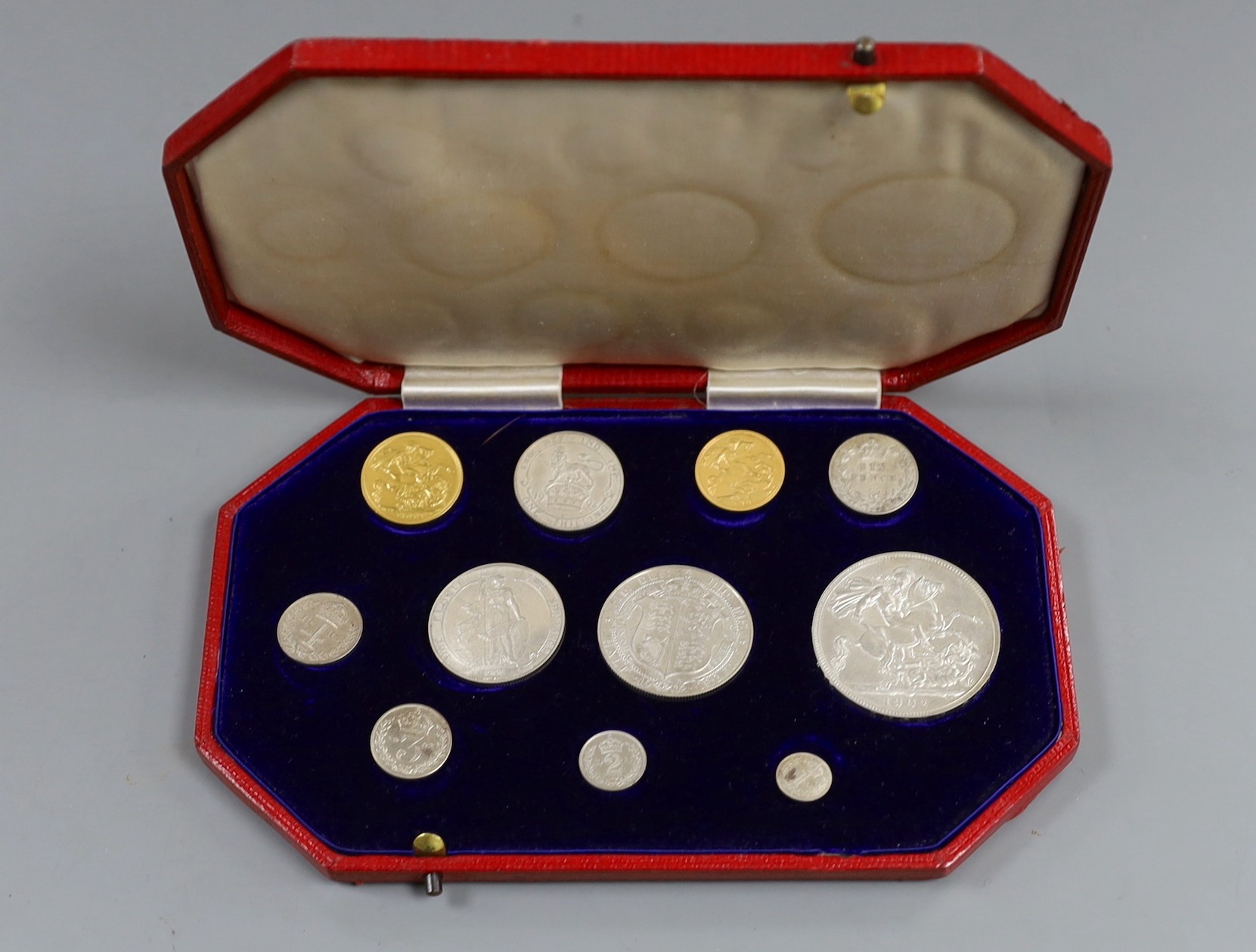 A cased Edward VII eleven-coin specimen set, matt surface, 1902, full gold sovereign through to Maundy 1d, hairlines otherwise near FDC